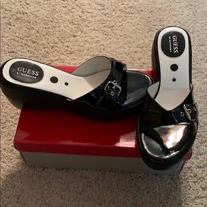 Guess Black sandals with a slight wedge